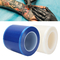 Rolo de filme dental dinâmico da barreira com o filme azul esparadrapo da barreira da caixa do distribuidor para dental, médico &amp; a tatuagem